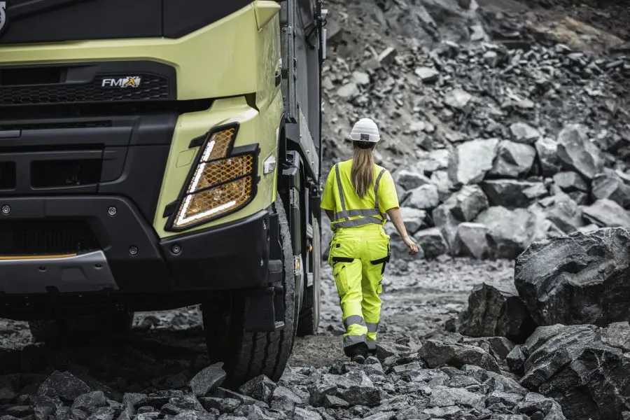 Woman And Volvo Fmx Truck, Topspot