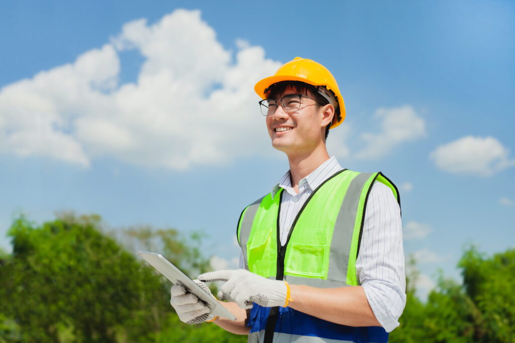 engineer at a construction site working during a project review
