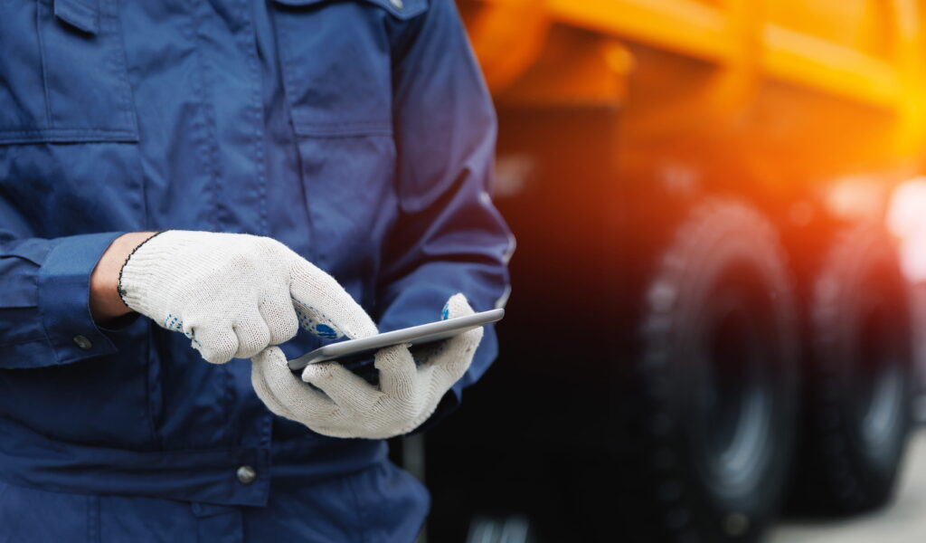 an engineer looking at a tablet